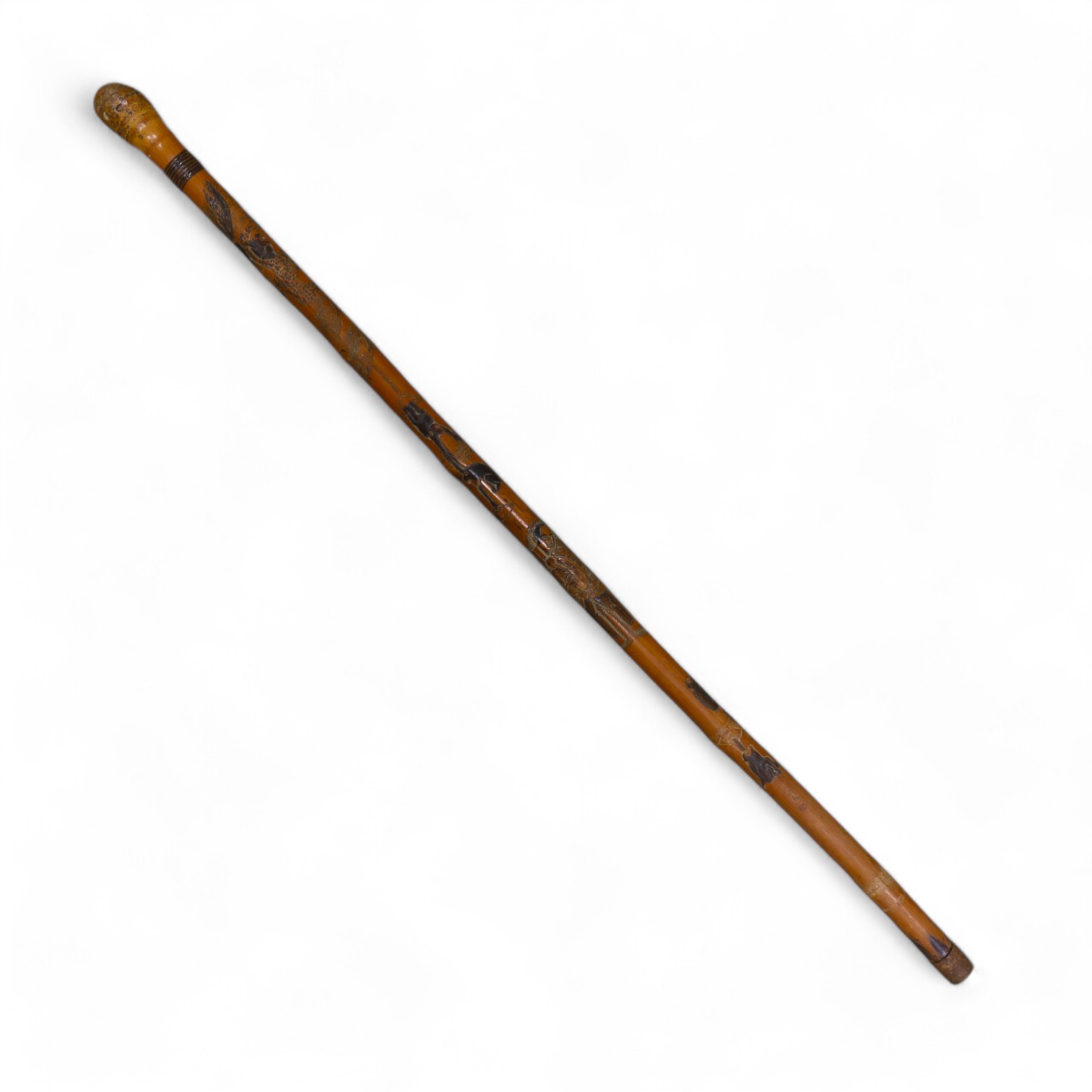 A Japanese carved and signed walking cane, 87cm high. Condition - fair to good